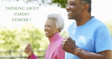 Think Again About Cardio Exercise. Picture of an older black female and male power walking.