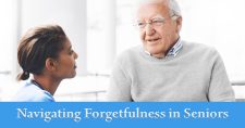 Navigating Forgetfulness in Seniors: Recognizing Signs and Taking Action. Picture of a young black female nursing aide talking with an older caucasian male.